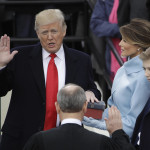 
              Donald Trump is sworn in as the 45th president of the United States by Chief Justice John Roberts as Melania Trump looks on during the 58th Presidential Inauguration at the U.S. Capitol in Washington, Friday, Jan. 20, 2017. (AP Photo/Matt Rourke) '
            