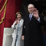 
              Former President George W. Bush and his wife Laura Bush wave as they arrive on Capitol Hill in Washington, Friday, Jan. 20, 2017, for the presidential inauguration of Donald Trump. (Saul Loeb via AP, Pool)
            