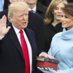 
              Donald Trump is sworn in as the 45th president of the United States as Melania Trump looks on during the 58th Presidential Inauguration at the U.S. Capitol in Washington, Friday, Jan. 20, 2017. (AP Photo/Andrew Harnik)
            