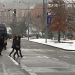 Students walk the snowy streets in the U-District, Feb. 6, 2017. (Dyer Oxley, MyNorthwest)