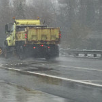 A snowplow clears the roads near Northgate Monday morning. (MyNorthwest)