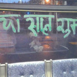 King County Metro bus driver Kathy Maddux writes positive messages on her bus windows every day. The messages are often in the different languages of her passengers. (MC Metro)