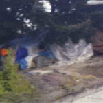 Seattle police served a warrant to this homeless camp suspected of dealing meth. The camp is located near I-5 and I-90. (SPD)