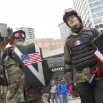 Pro-Trump demonstrators with shields to protect themselves as they march through Seattle. (KIRO 7)