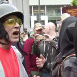 A pro-Trump demonstrator yells at passersby at Westlake Park. (KIRO 7)