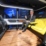 Matthias Mueller, the CEO of Volkswagen, sits inside the VW autonomous concept car Sedric, during a presentation at the 87th Geneva International Motor Show in Geneva, Switzerland, Monday March 6, 2017. (Uli Deck/dpa via AP)