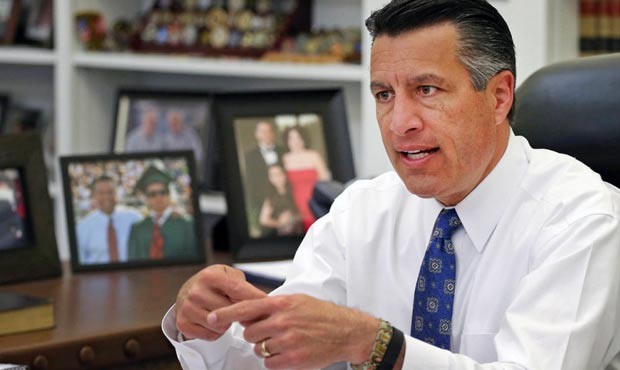 Whether or not Nevada Gov. Brian Sandoval signs a bill that will allow everyone to sign up for Medi...