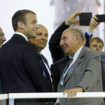 French President Emmanuel Macron, left, listens to Dassault Aviation CEO Eric Trappier, center, and Dassault chairman Serge Dassault, right, while visiting the Paris Air Show in Le Bourget, north of Paris, Monday, June 19, 2017. Macron landed at the Bourget airfield in an Airbus A400-M military transport plane to launch the aviation showcase. At left is French politician Olivier Dassault. (AP Photo/Michel Euler)