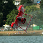 Greg Gilbert began photographing the Seafair hydro races when he was 15 years old, and has only missed them once since then; in this image, Chip Hanauer flips the Miss Budweiser on Lake Washington in August 1994.  Greg Gilbert Seattle Times photo. 