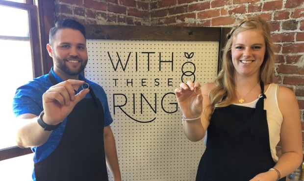 Jenny Horton and Mat Schramm show off the wedding bands they just made. (Photo by Rachel Belle)...