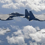 
              In this photo provided by South Korea Defense Ministry, South Korean F-15K fighter jets drop bombs as they fly over the Korean Peninsula during a joint drills with the U.S., South Korea  on Monday, Sept. 18, 2017. South Korea says the U.S. military has flown powerful bombers and stealth jets over the Korean Peninsula in joint drills with South Korean warplanes. (South Korea Defense Ministry via AP)
            