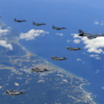 
              In this photo provided by South Korea Defense Ministry, U.S. Air Force B-1B bomber, F-35B stealth fighter jets and South Korean F-15K fighter jets fly over the Korean Peninsula during a joint drills, South Korea on Monday, Sept. 18, 2017. Monday's flyovers came three days after North Korea fired an intermediate-range missile over Japan into the northern Pacific Ocean in apparent defiance of U.S.-led international pressure on the country. The North conducted its sixth nuclear test on Sept. 3 and was subsequently hit with tough, fresh U.N. sanctions.  (South Korea Defense Ministry via AP)
            