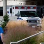 Ambulances line up in the emergency area of Sacred Heart Hospital following reports of a shooting at Freeman High School on Wednesday, Sept. 13, 2017 in Rockford, Wash. (Kathy Plonka/The Spokesman-Review via AP)