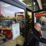
              A shopper exits a Value Village store Tuesday, Dec. 12, 2017, in Edmonds, Wash. The company that operates 300 Value Village, Savers and other thrift stores in the U.S., Canada and Australia is suing Washington state Attorney General Bob Ferguson, saying his office has violated its rights by demanding $3.2 million to settle a three-year investigation. (AP Photo/Elaine Thompson)
            