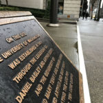 Where the Metropolitan Theatre once stood, this marker commemorates the original location of the University of Washington, along what’s now University Street.  (Feliks Banel)