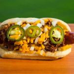 Jack's BBQ's jalapeño-cheddar sausage on a bun. (Ben VanHouten/Mariners)