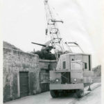 The U.S. Navy loaned a  crane to help  install  the vintage coastal  artillery guns at Fort  Casey State Park in July  1968. (Official  U.S.  Navy  Photograph)