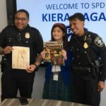 Officer Kevin Stuckey, winner Kiera Nagai, and Seattle Police Chief Carmen Best. (Dyer Oxley, MyNorthwest)