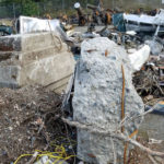 Pieces of the bridge that the Amtrak 501 train dangled off of after the crash. (Nathan Rich)