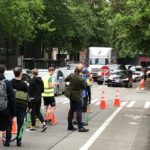 Bike activists block a lane of traffic in Seattle. (KIRO 7)