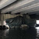 A homeless boat was spotted underneath the 520 Bridge in Seattle in late April 2018. (Courtesy photo)