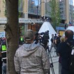 The Seattle Fire Department brought in trucks and ladders to reach protesters on top of the "tarpees." (Graham Johnson, KIRO 7)