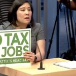 A representative with Uwajimaya speaks at a special Seattle City Council meeting on the repeal of the head tax. She did not support the tax. (Seattle Channel)