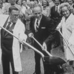 At the groundbreaking for the Fred Hutchinson Cancer Research Center in August 1973, Senator Warren G. Magnuson (left); Fred Hutchinson’s brother Dr. William Hutchinson (center); and Maguson’s wife Jermaine turn shovels of earth. (Fred Hutchinson Cancer Research Center)