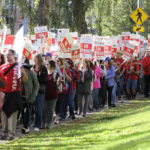 
              Striking teachers march around the Tacoma School District Central Administration Building, Monday, Sept. 10, 2018, in Tacoma, Wash. Teachers in the district have been on strike since last week. (AP Photo/Ted S. Warren)
            