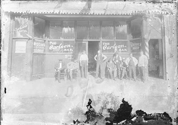 The Carlson Bar was located in Wilkeson in Pierce County; do you recognize any of these people? (Washington State Historical Society)