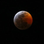 This photo shows the moon during a total lunar eclipse, seen from Los Angeles, Sunday Jan. 20, 2019. The entire eclipse will exceed three hours. Totality - when the moon's completely bathed in Earth's shadow - will last an hour. Expect the eclipsed, or blood moon, to turn red from sunlight scattering off Earth's atmosphere. (AP Photo/Ringo H.W. Chiu)