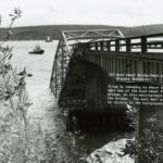 The western portion of the original Hood Canal Bridge sank in a windstorm on February 13, 1979; the repaired bridge opened in 1982. (Washington State Archives)