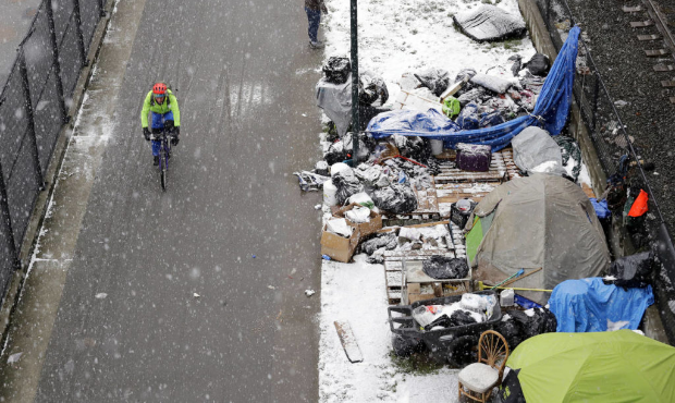 A homeless encampment in Seattle during the snowstorm. (AP Photo/Elaine Thompson)...