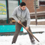 Erik Balderas shovels snow at Top Banana, a produce shop in the Ballard neighborhood, after a large storm blanketed the city with snow on February 9, 2019 in Seattle, Washington. Seattle almost reached its yearly amount of snowfall in a day. (Photo by David Ryder/Getty Images)