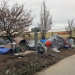 Illegal Homeless Encampment with visible drugs, needles and human waste. Feels dangerous to walk beside. Right on Burke Gilman trail. (City of Seattle)