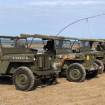 Part of a convoy of six vintage WWII US Army jeeps on Utah Beach at last week's D-Day 75th anniversary observance in Normandy, France. (SPEARHEAD VI)