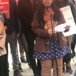 Councilmember Kshama Sawant speaks at a protest after the tech company donated $1.5 million to a PAC aimed at Seattle elections. (Hanna Scott, KIRO Radio)