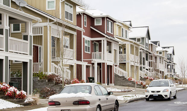 Image: A row of houses in Seattle as household income in Seattle rises. (Flickr Creative Commons)...