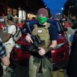 SEATTLE, WA - JUNE 10: A volunteer works security at an entrance to the so-called "Capitol Hill Autonomous Zone" on June 10, 2020 in Seattle, Washington. The zone includes the blocks surrounding the Seattle Police Departments East Precinct, which was the site of violent clashes with Black Lives Matter protesters, who have continued to demonstrate in the wake of George Floyds death. (Photo by David Ryder/Getty Images)