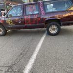 At 12th and Pine in CHOP, a car blocks a lane the city negotiated to remain open. (Photo: Hanna Scott/KIRO Radio)