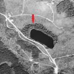 An aerial photo from 1954 may show damaged tree tops, which could be evidence of the crash of a two-seat Navy plane into Black Lake, east of Carnation, in March 1949. (US Geological Survey, annotated by Lee Corbin)