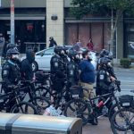 Seattle police make one of many arrests during the Seattle riot. (Photo: Jason Rantz/KTTH)