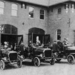 One of these fire trucks – known as a “motorized hose wagon” was lost in the Grand Trunk Pacific fire and ended up in Elliott Bay; photo taken at old Fire Station 25 at Harvard Avenue and East Union Street. (Last Resort Fire Department)