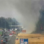 Crews are responding to a brush fire on NB I-5 near South 320th Street and blocking one right lane. Expect slowing in each direction. (WSDOT Traffic)