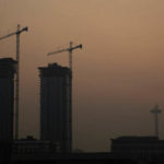 SEATTLE, WA - SEPTEMBER 11:  Cranes and the Space Needle are silhouetted in hazy smoke from wildfires as the sun sets on September 11, 2020 in Seattle, Washington. According to reports, air quality is expected to worsen as smoke from dozens of wildfires in forests of the Pacific Northwest and along the West Coast descends onto the region. (Photo by Lindsey Wasson/Getty Images)