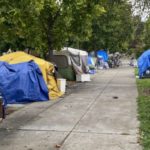 Seattle homelessness has exploded, made worse by a Seattle City Council ad Mayor's office that stay silent. This is at Ballard Commons Park (Photo: Jason Rantz).