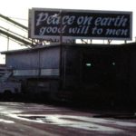 The holiday greeting covered up the entire Buse Timber sign for about a month each year, going back to 1964, around the same time that I-5 was built just east of the mill. (Buse Family)