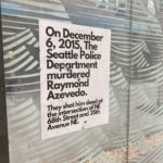 Activists put up a flyer that lies about a police shooting. (Photo: Jason Rantz/KTTH)