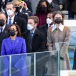 WASHINGTON, DC - JANUARY 20: Doug Emhoff (from left), Vice President Elect Kamala Harris, Cole Emhoff,  Ella Emhoff, and Vice President Mike Pence stand as Lady Gaga sings the National Anthem at the inauguration of U.S. President-elect Joe Biden on the West Front of the U.S. Capitol on January 20, 2021 in Washington, DC.  During today's inauguration ceremony Joe Biden becomes the 46th president of the United States. (Photo by Win McNamee/Getty Images)