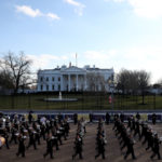 WASHINGTON, DC - JANUARY 20:  Members of a marching band walk the abbreviated parade route following the inauguration of U.S. President Joe Biden on January 20, 2021 in Washington, DC. Biden became the 46th president of the United States earlier today during the ceremony at the U.S. Capitol. (Photo by Patrick Smith/Getty Images)